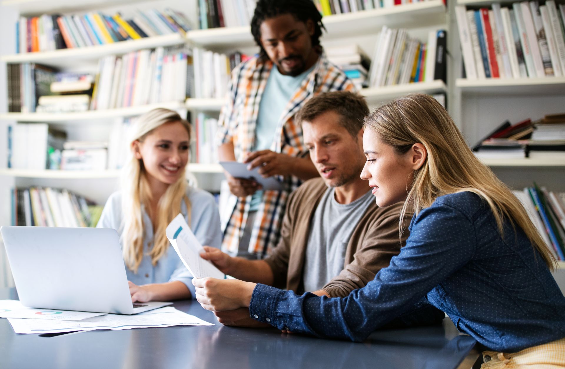 Diverse colleagues going over plans