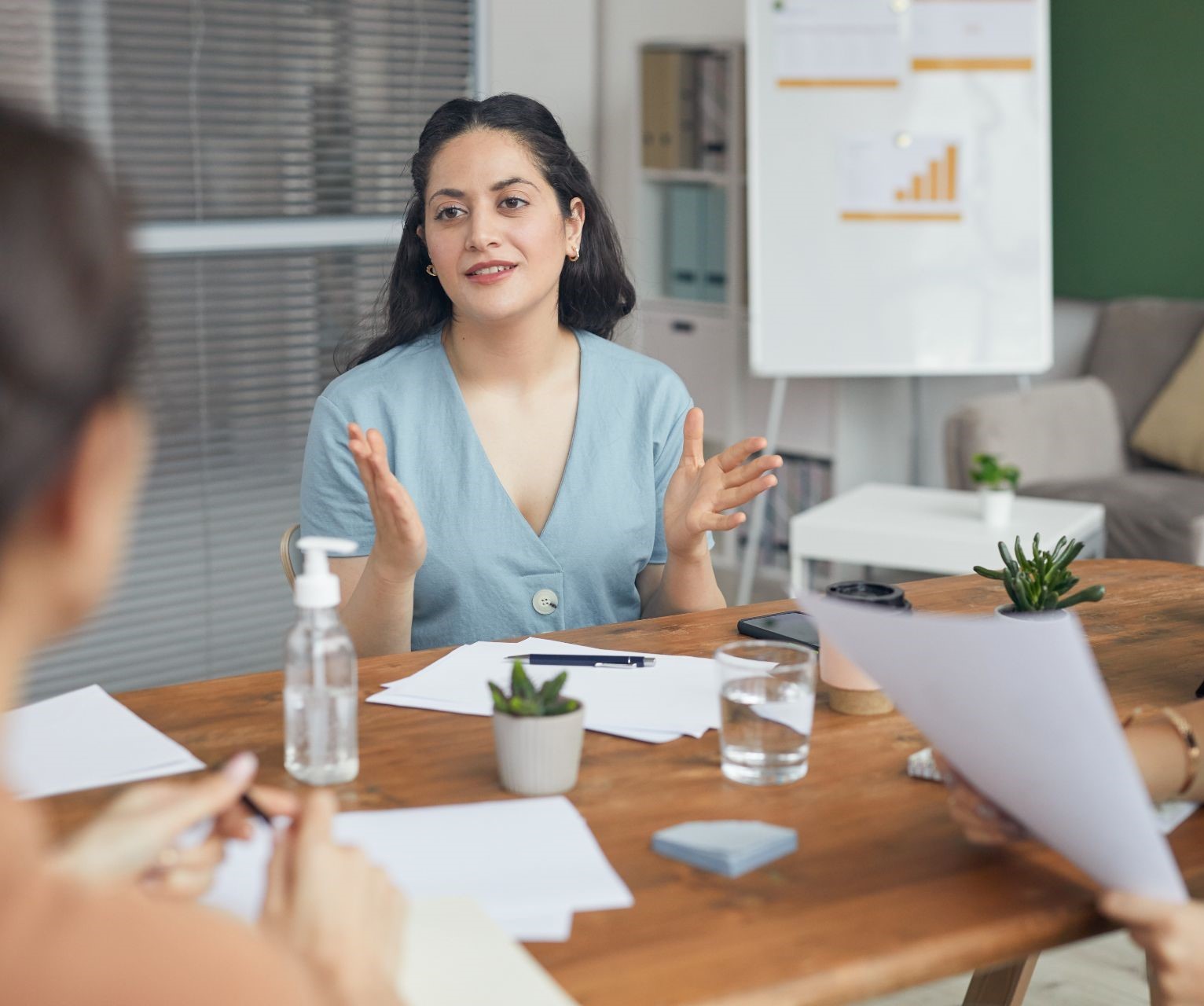 Businesswoman leading group discussion.